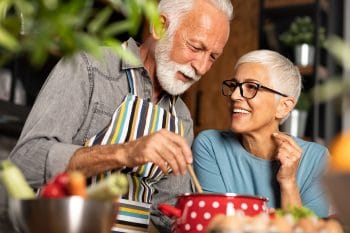 example of a senior couple comfortable with biting and chewing thanks to restorative dental work